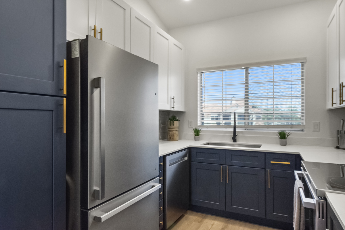 Fully equipped kitchen with full-size fridge, stove, oven and microwave. 