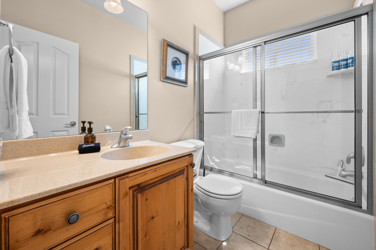 Full bathroom with shower/tub combo—perfect for a relaxing soak or quick refresh.