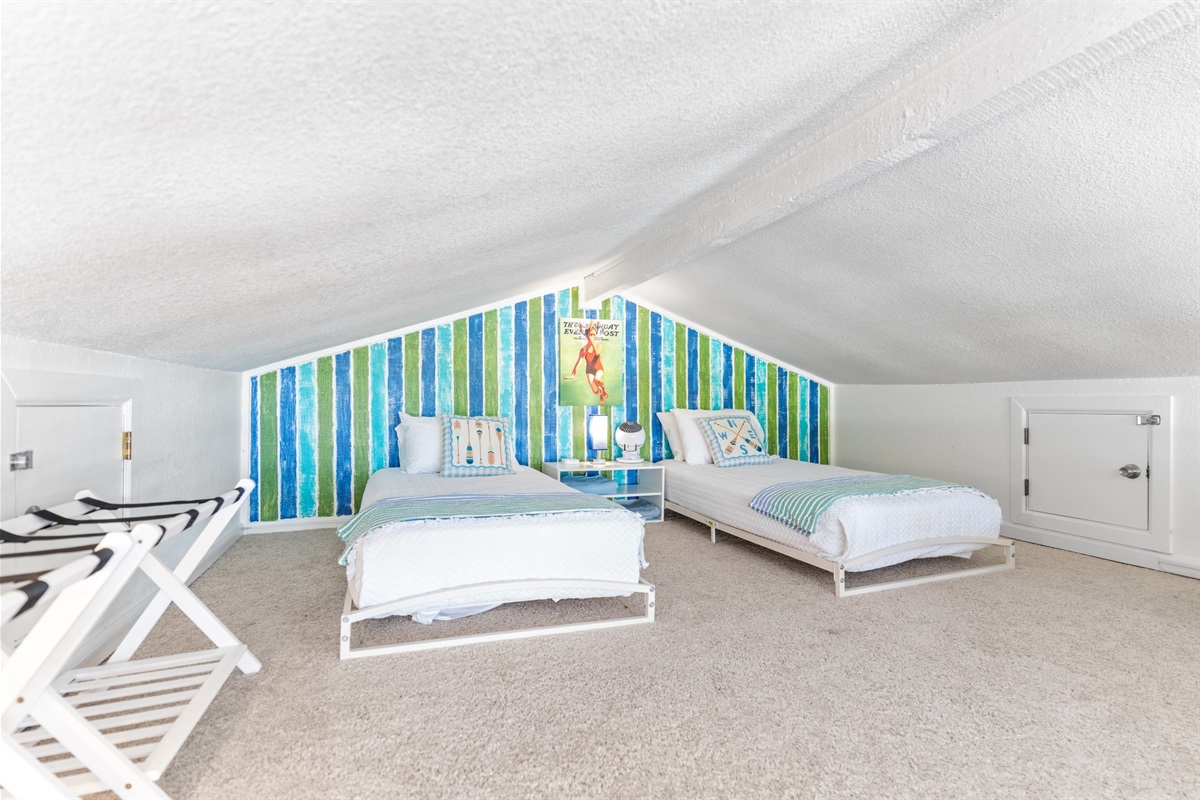 A tucked-away hangout space for movies, games, or quiet time.