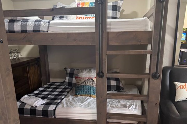 2 sets of full over full bunk beds