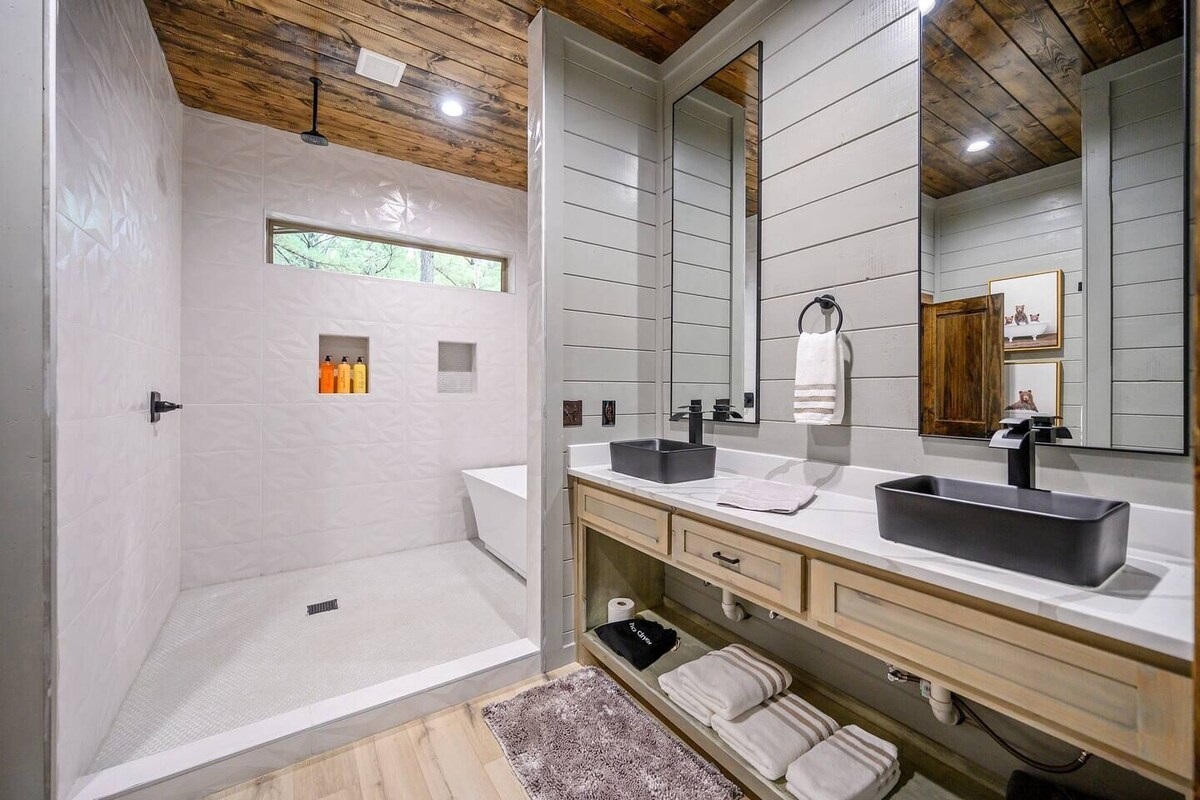 Stunning rainfall shower with soaker tub