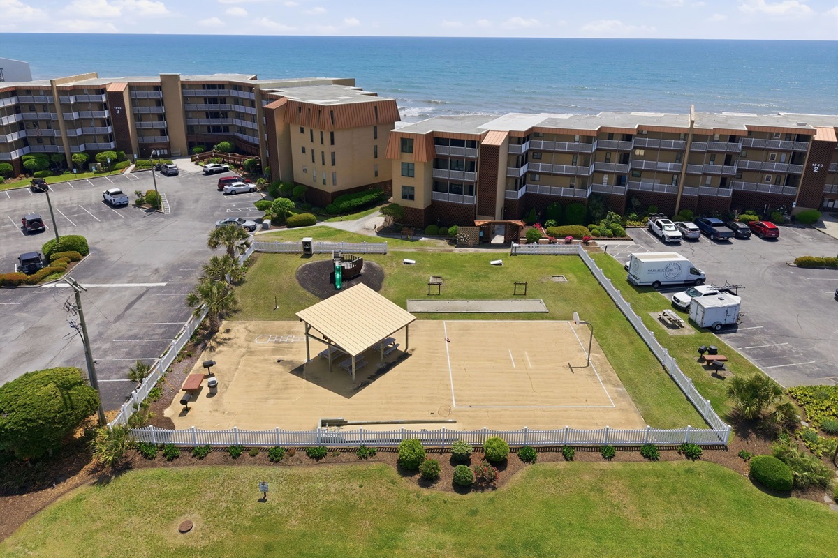 Spacious outdoor recreation area with ocean views and family-friendly amenities