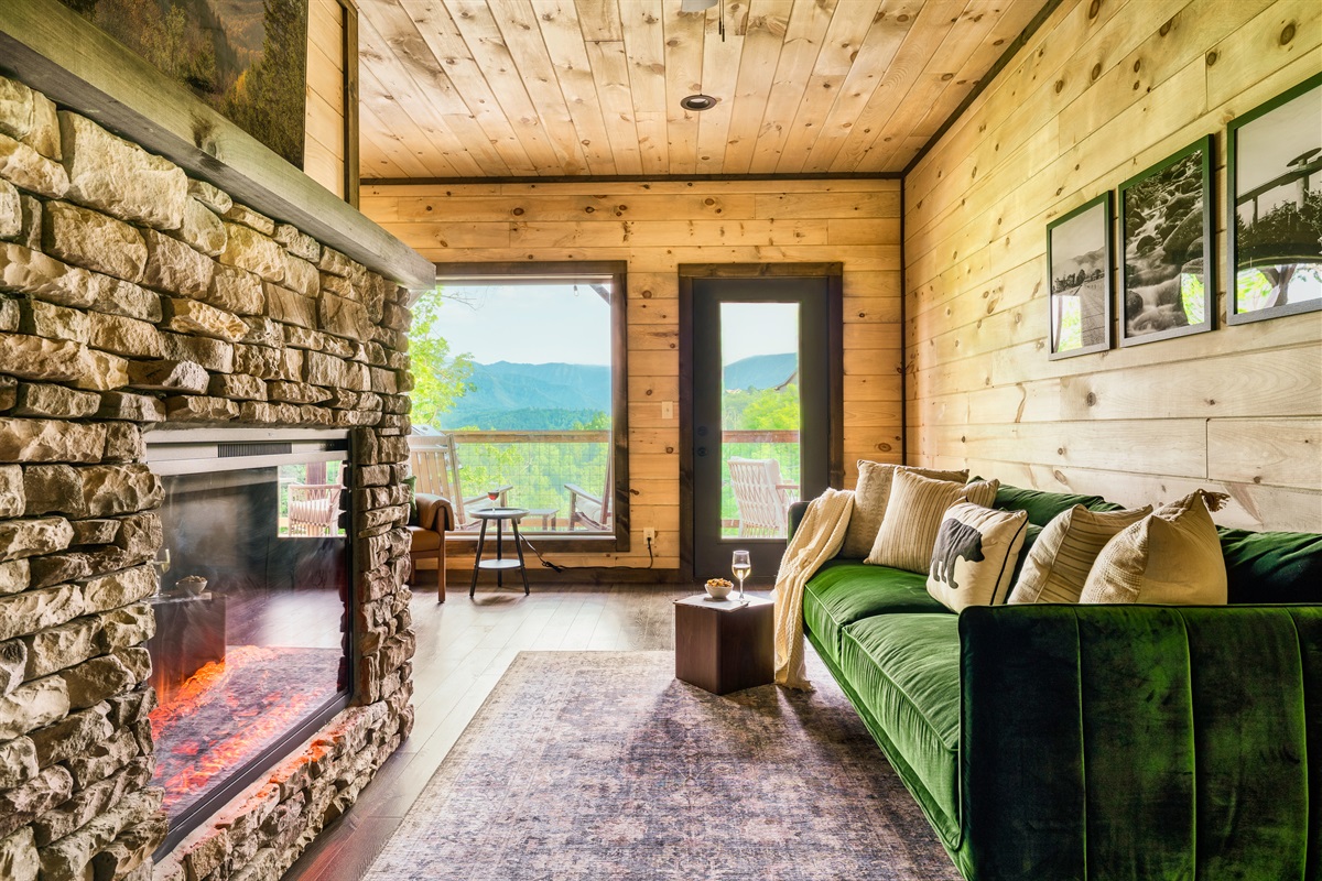 Cuddle by the fireplace, enjoy the mountain view, and watch your favorite TV show