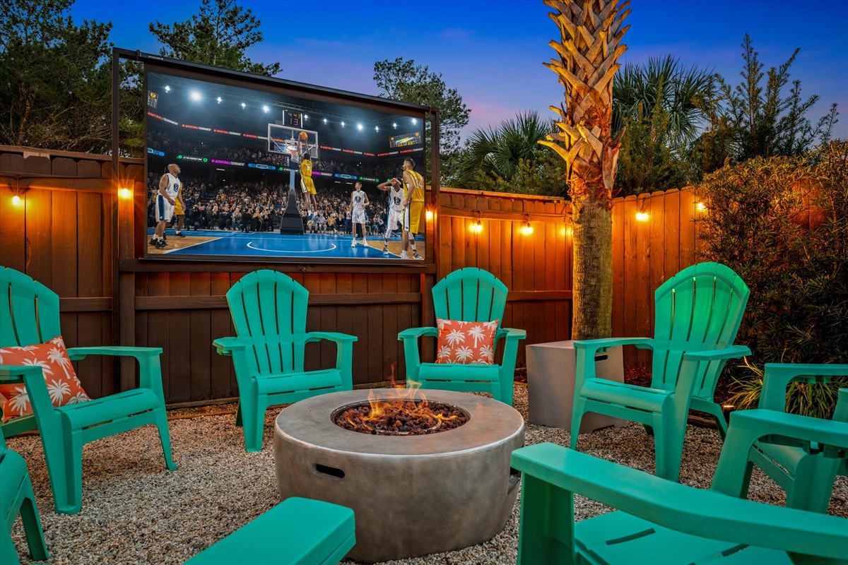 Movie night under the stars. Gather around the fire pit and watch your favorite film on the outdoor screen.