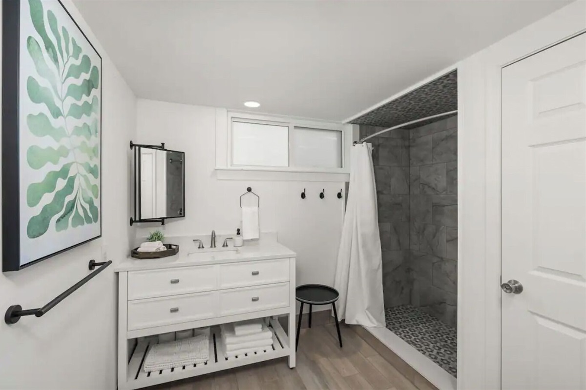 Eucalyptus Suite Bathroom includes vanity, toilet, and tile shower