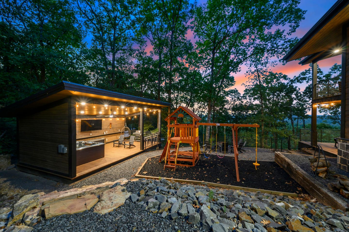 A fun outdoor playground keeps little ones entertained while the adults relax nearby