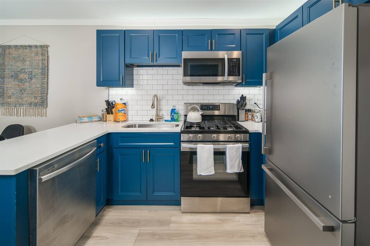 Unit 1: Kitchen with new stainless steel appliances