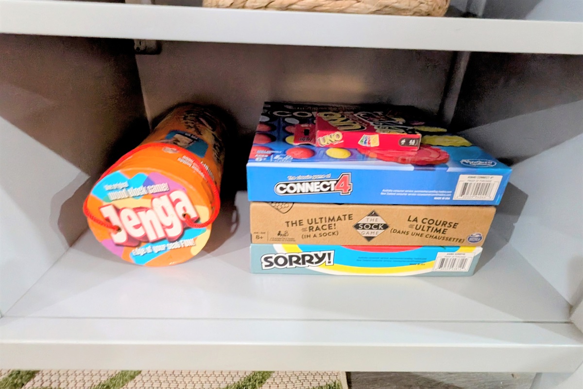 Games, toys, and kid-friendly books are available for guest entertainment.