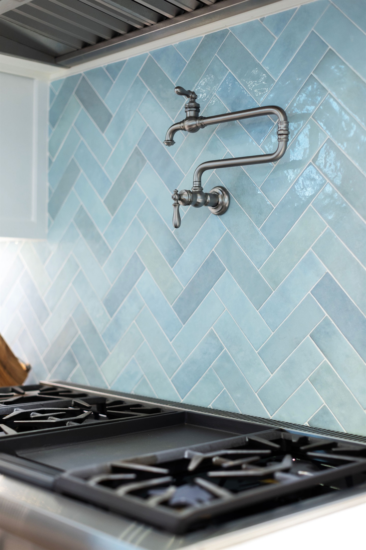 A Thermador 48' gas range allows for chef quality meals and tasty pancakes on the griddle.