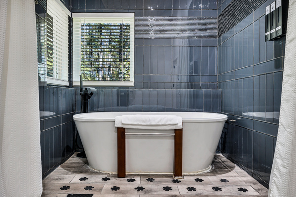 Unwind in the primary ensuite, where the deep freestanding tub creates a peaceful place to relax at the end of the day.
