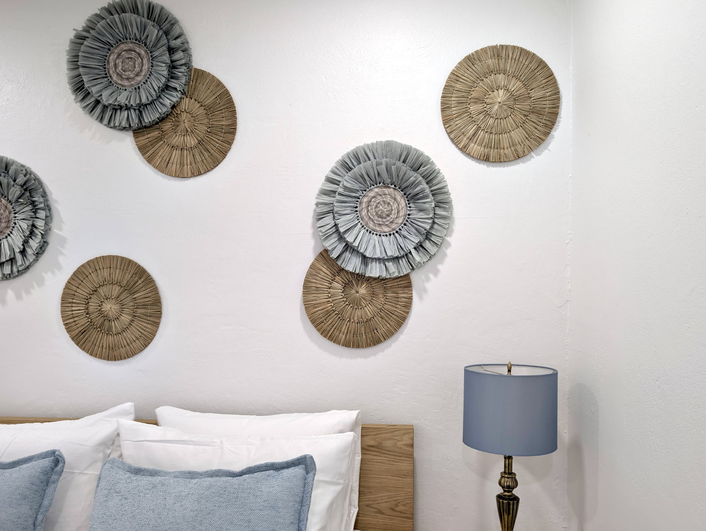 Beautiful textures and calming tones add the perfect finishing touch to this cozy bedroom retreat.