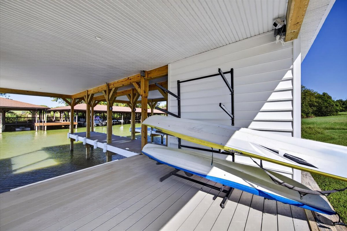 Convenient kayak and paddleboard storage located right at the boathouse.