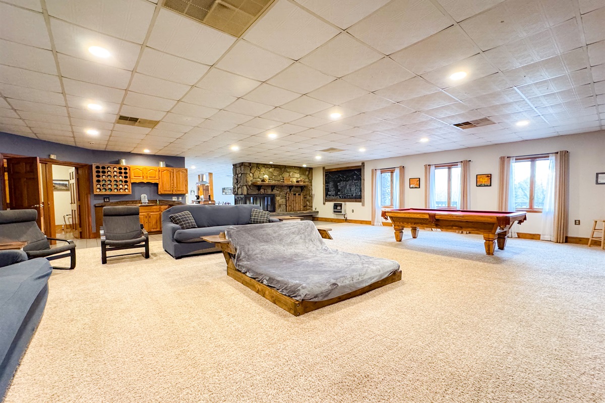 lower level living room complete with a custom lounger for the space!