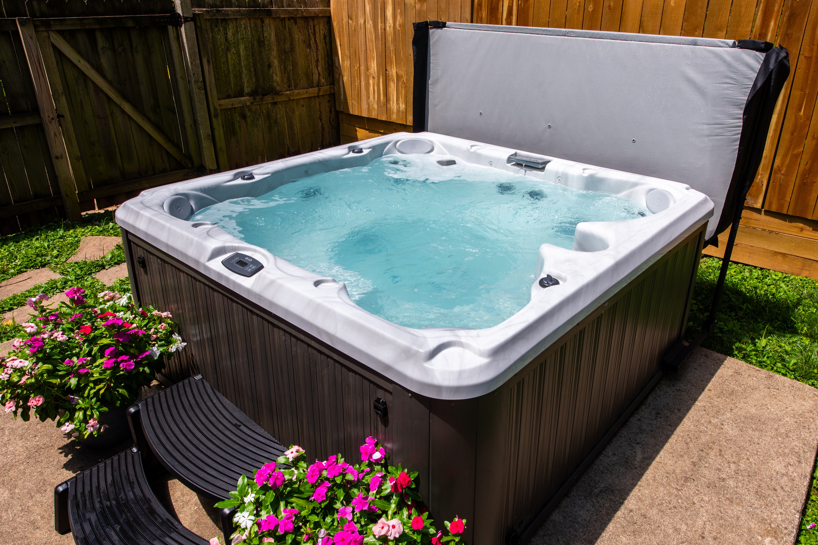 Relax in a private hot tub at this Louisville home on the Kentucky Bourbon Trail. It’s the perfect spot to unwind after a day of exploring!  