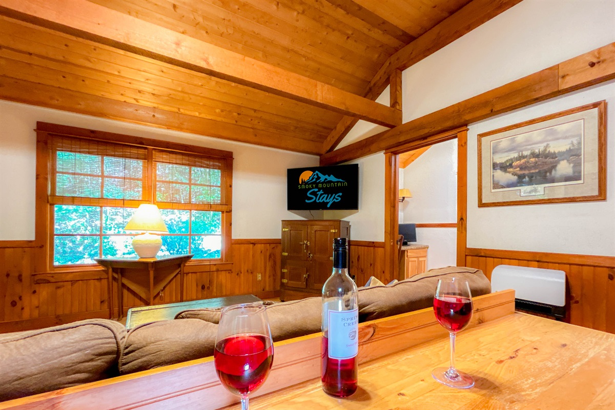 spacious living room complete with 50" smart-tv. 