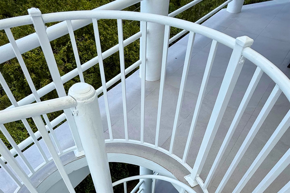 Take the spiral staircase down to the lowest level where you'll find a full apartment