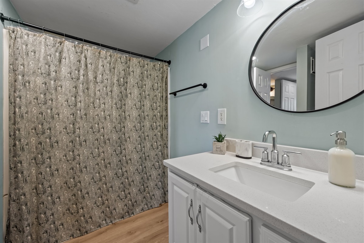 Fresh modern bathroom with all essentials.