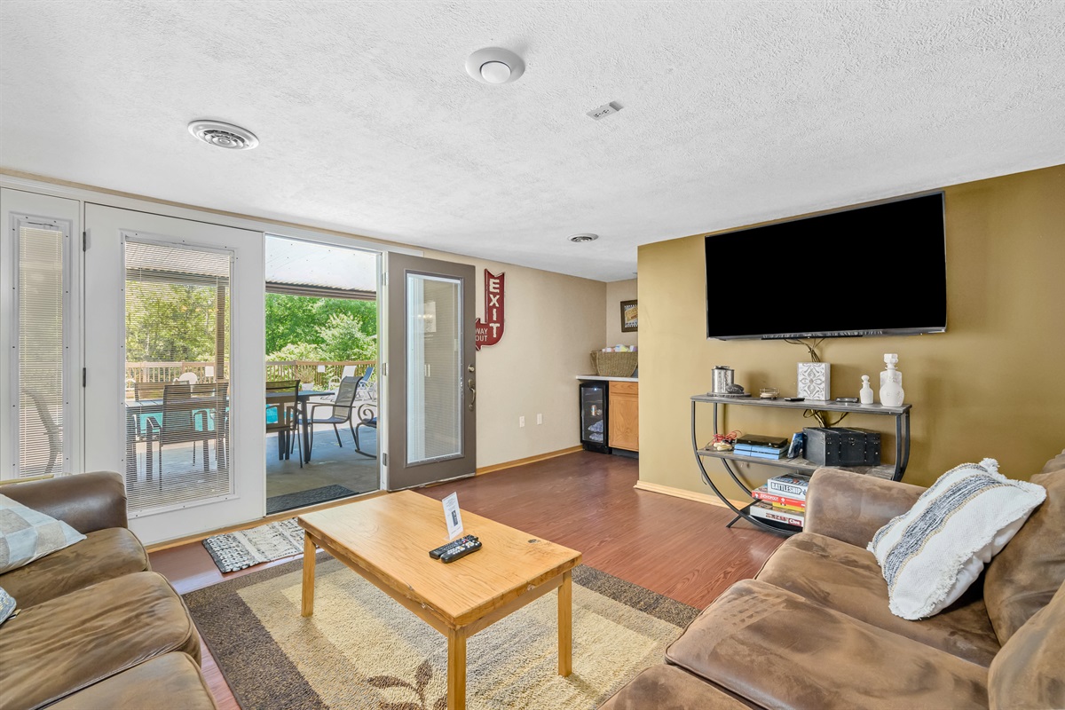 Enjoy the lower level with PS4 gaming system, beverage fridge for drinks by the pool, or catching a new movie!