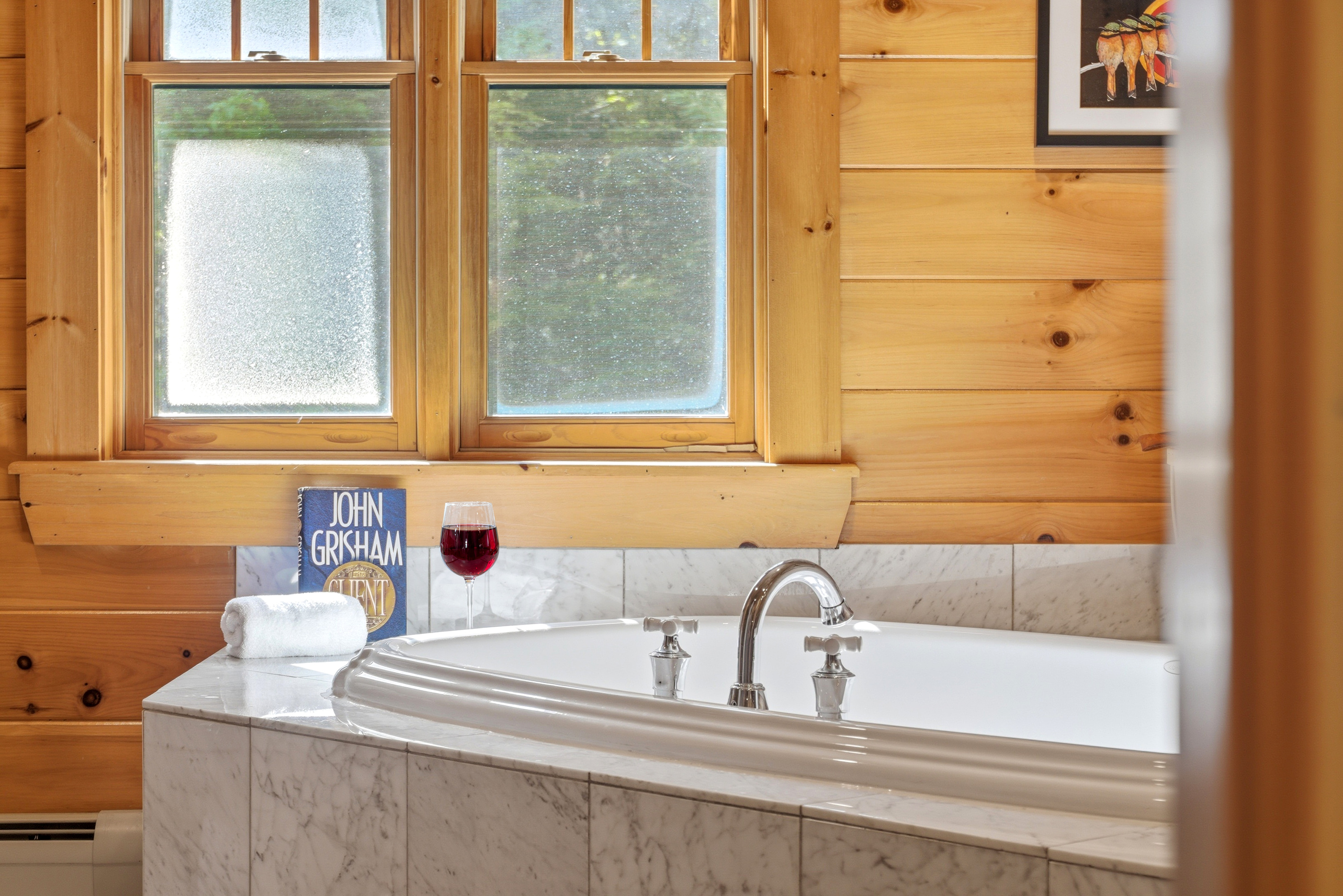Unwind and recharge with a soothing soak in the oversized whirlpool tub.