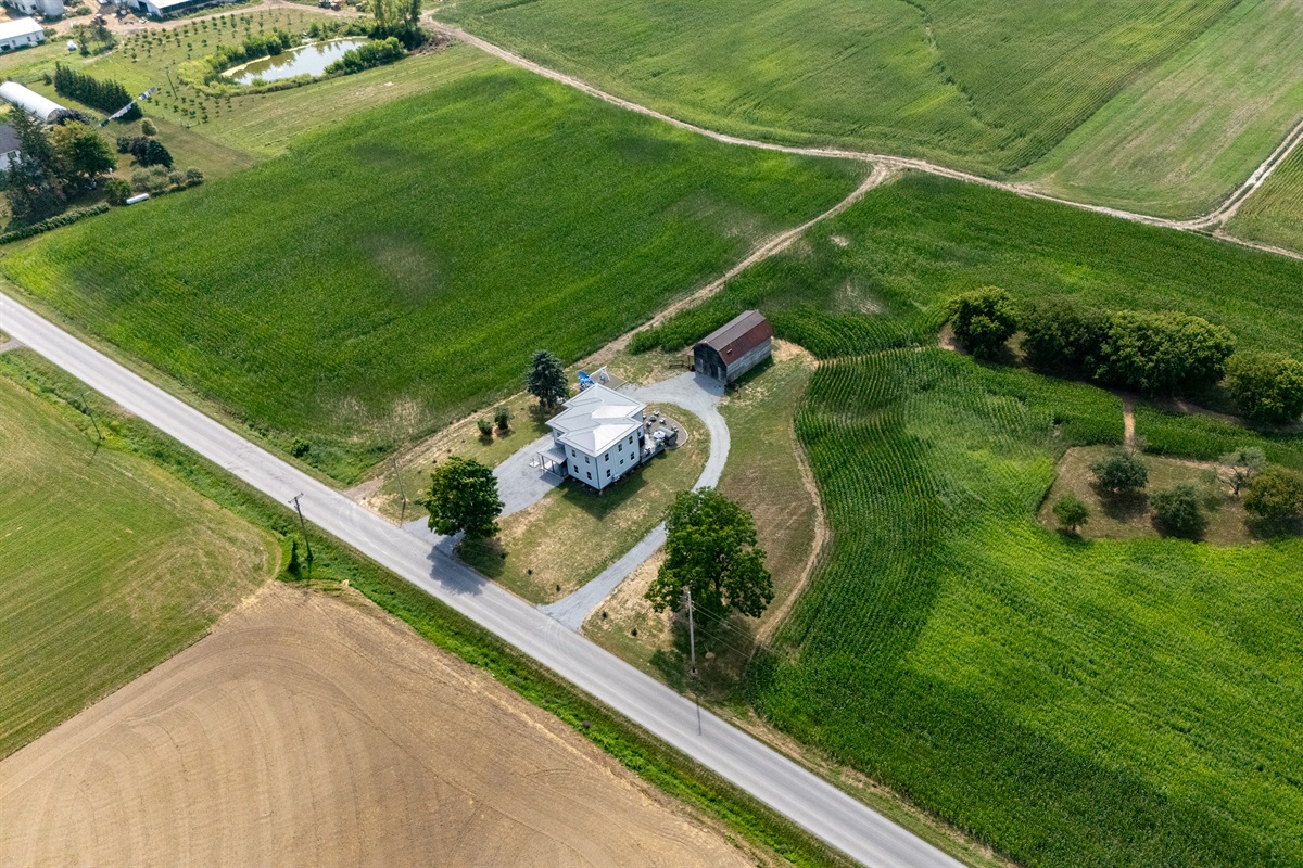 Bird’s-eye view showcasing endless farmland and privacy—ideal for serene country living.