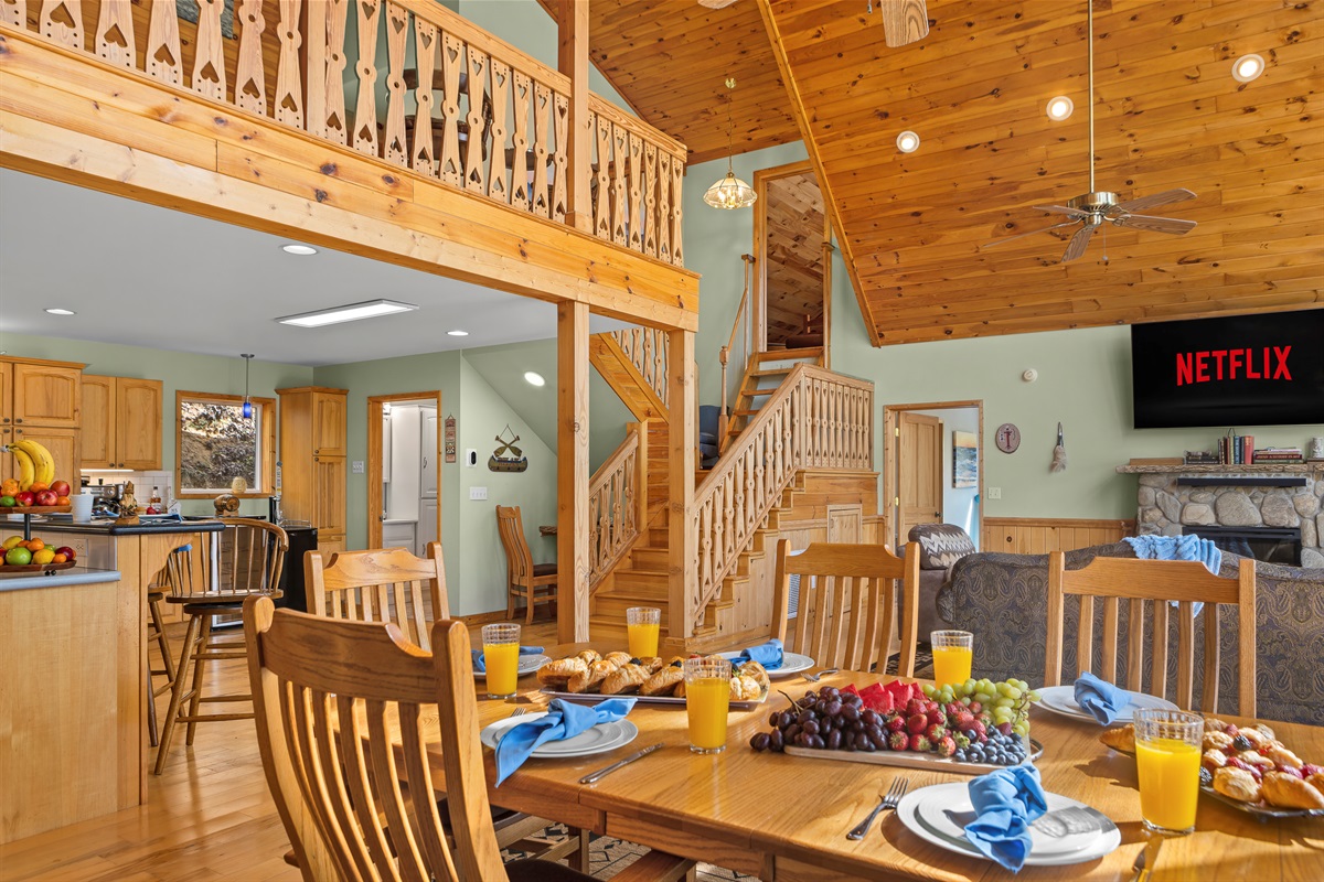 Dining Area: Delight in meals with friends against the backdrop of soaring wooden ceilings!