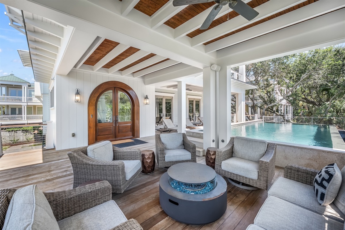 Sitting area on Front Porch with Fire Table Shore Thing | 4001 Palm Blvd | Isle of Palms, SC | IOP Escapes