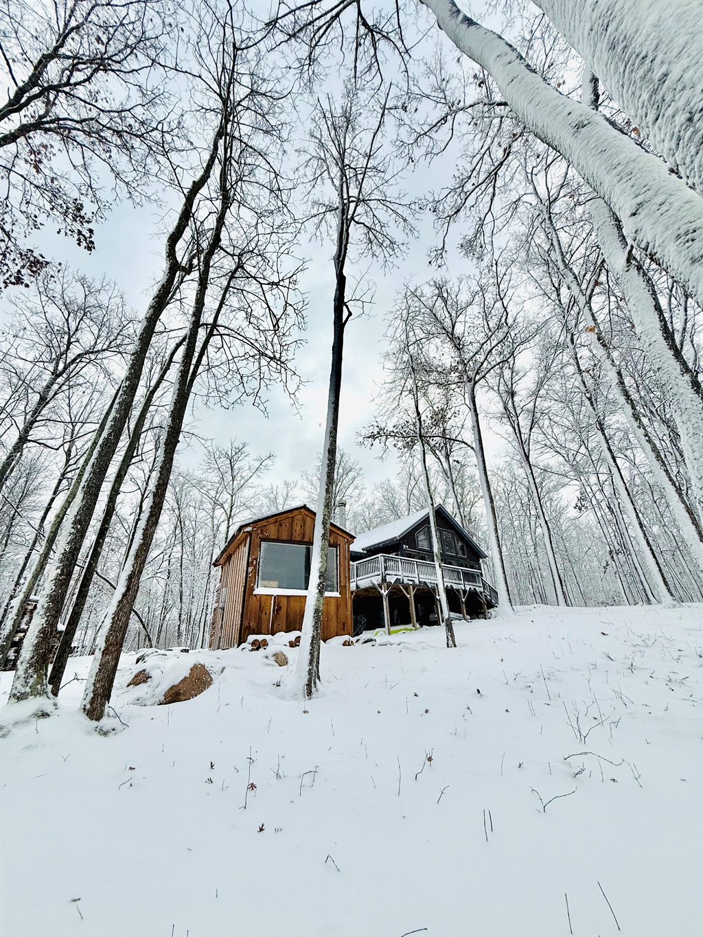 Our authentic wood burning sauna with a great view of the lake.