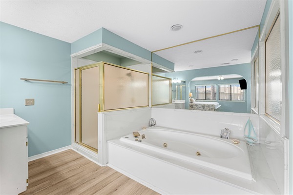 Large ensuite bathroom #1 with jacuzzi tub and walk in shower