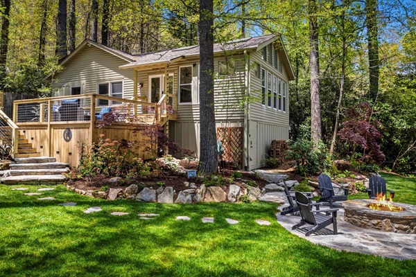 The property is interconnected by deck, fire pit and dock and Camp Cattail.