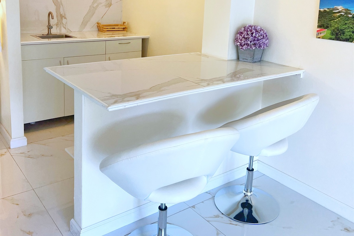 Breakfast bar seating to enjoy your morning coffee or quick meals.