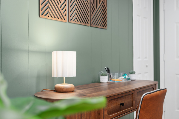 Work by day, unwind by night — a dedicated desk nook with wifi at our Berkeley Springs cottage.