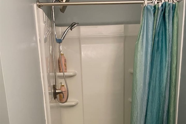 Shower is accessible, shower bench available in bath linen closet. 