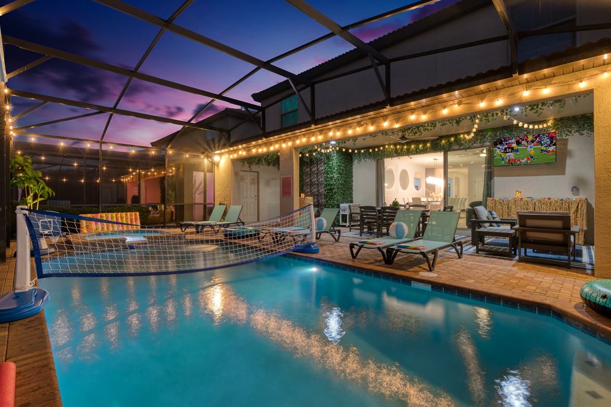 Enjoy a game of pool volleyball under the night skies!