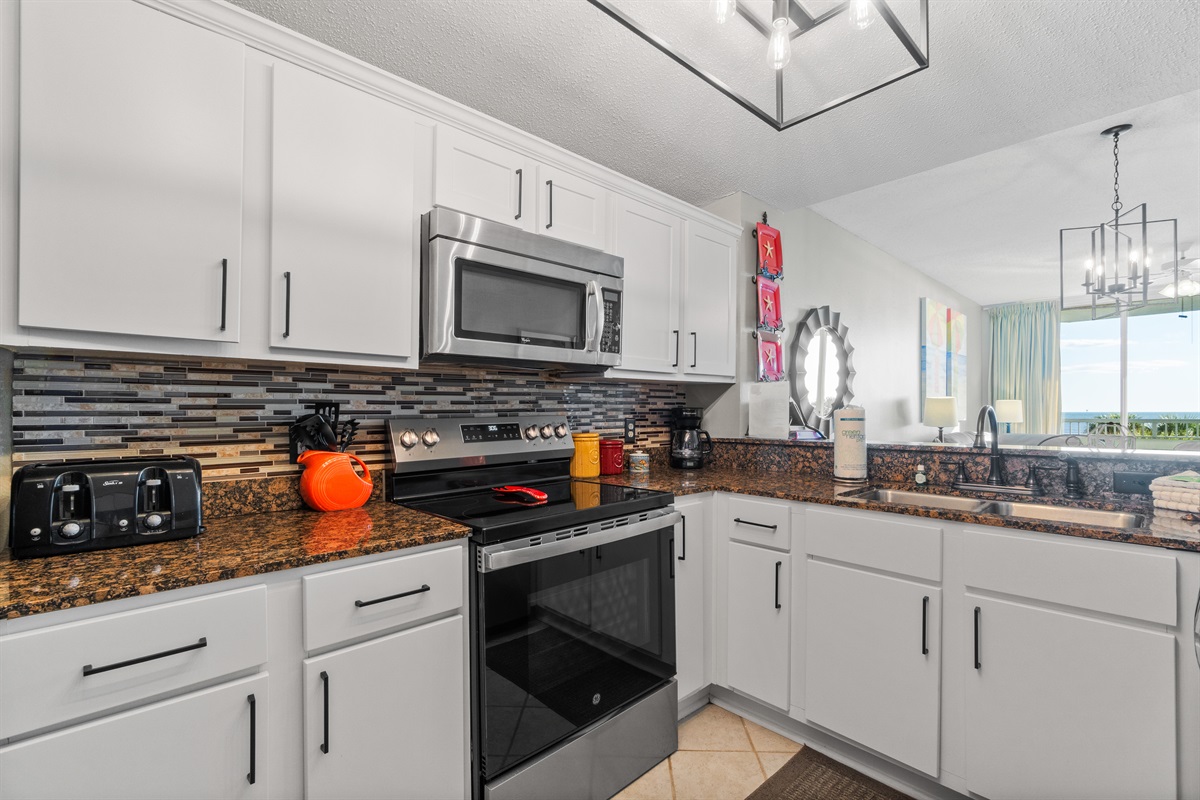 toaster, stove, microwave, sink, disposal