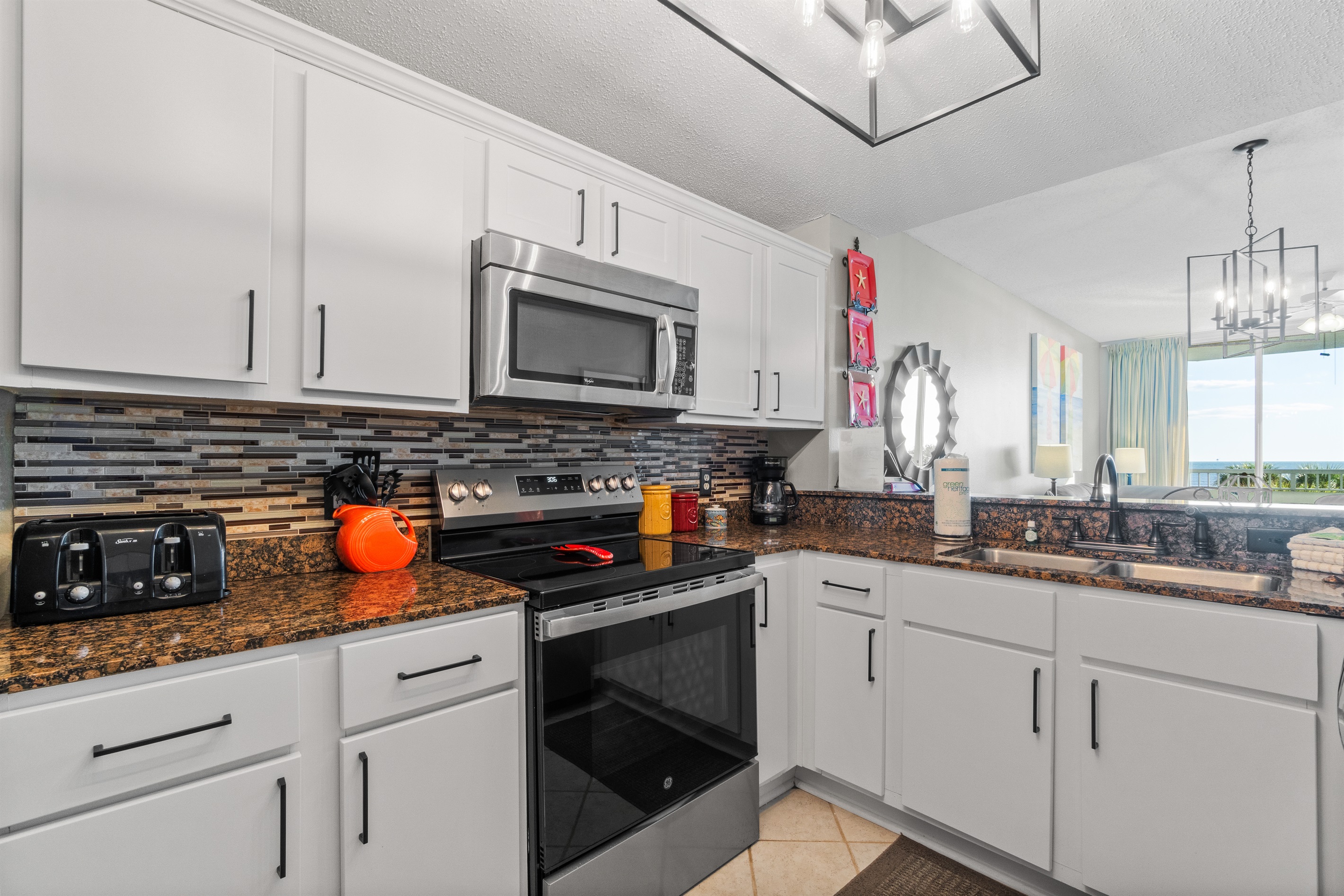 toaster, stove, microwave, sink, disposal