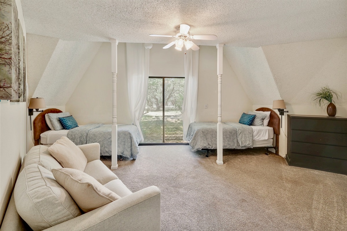Downstairs twin bedroom — perfect for kids or friends