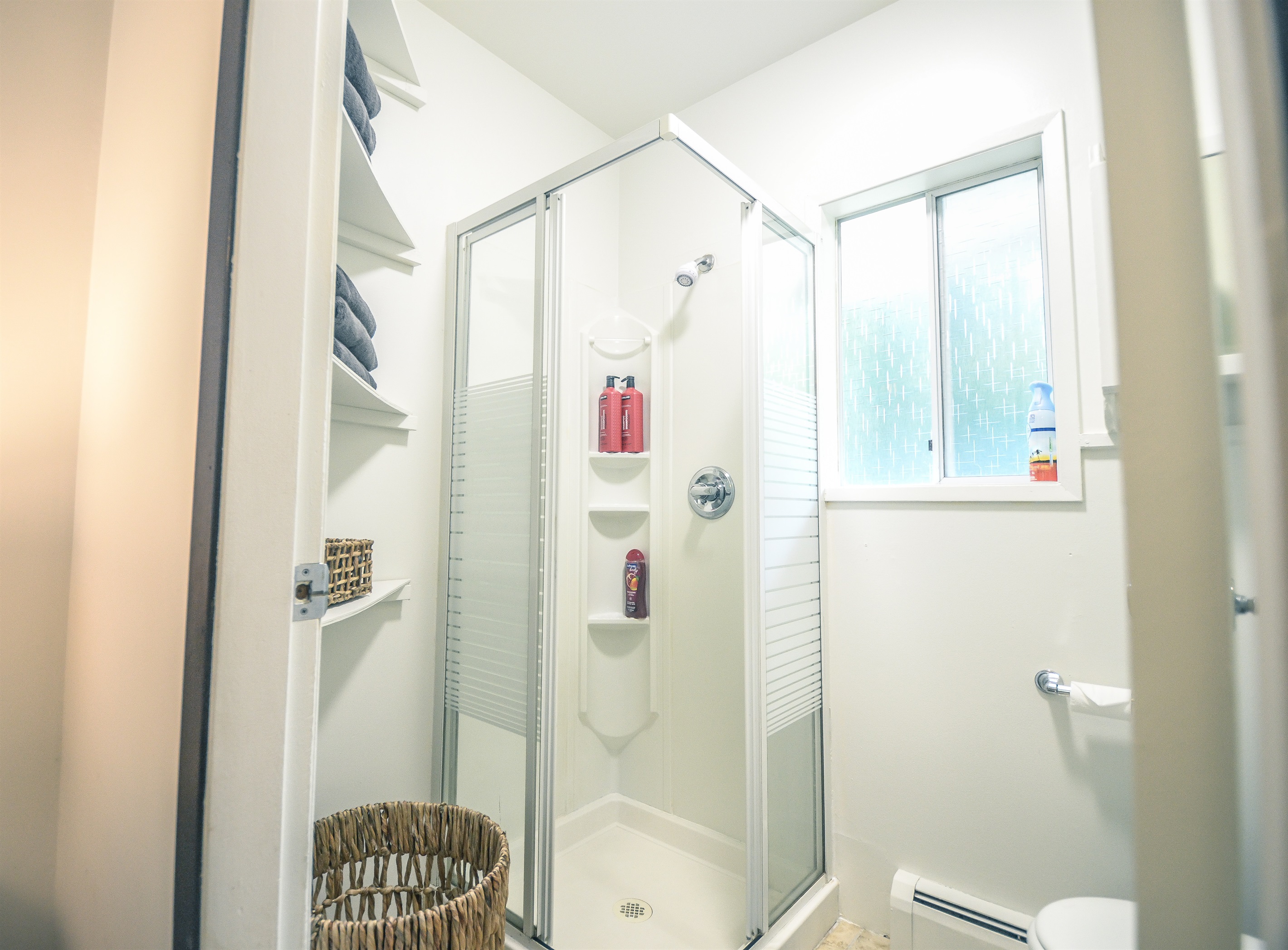 Private ensuite bathroom with standing shower
