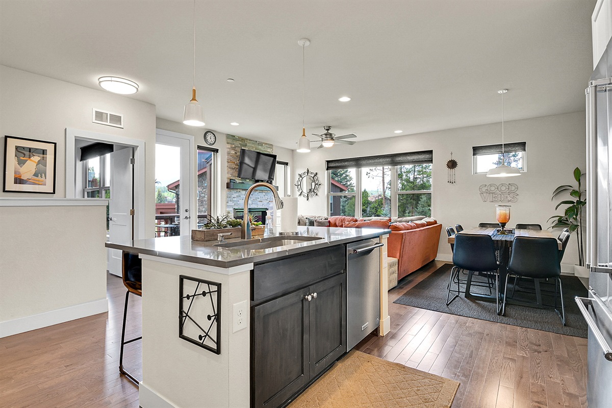 View from the kitchen into the dining and living room area
