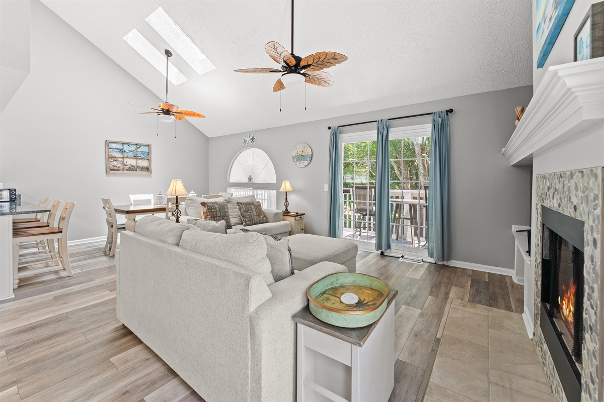 Lovely large living room area with access to the balcony
