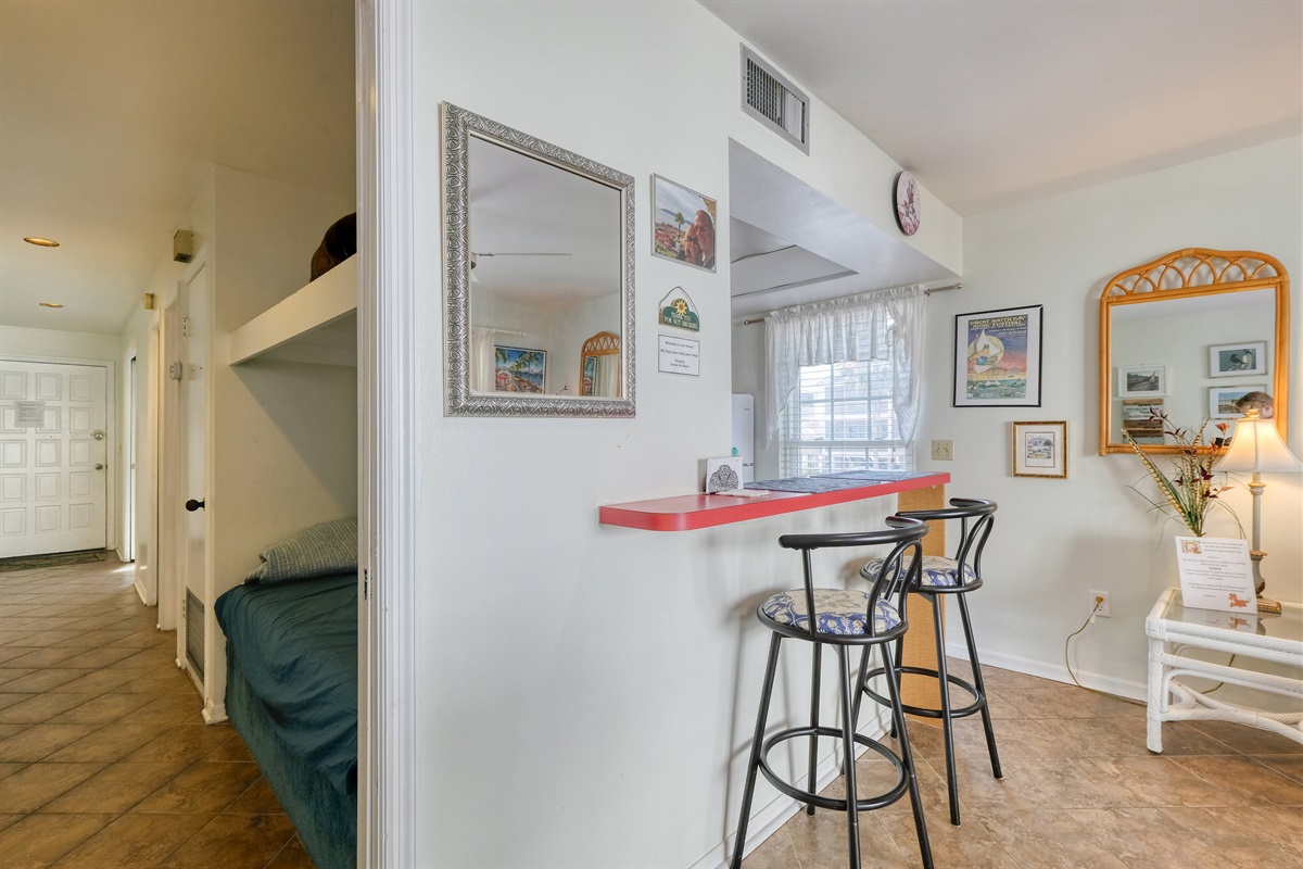 Bar top height seating off of kitchen