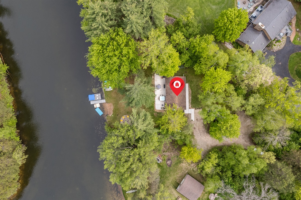 Where peaceful lake life meets a private wooded retreat.