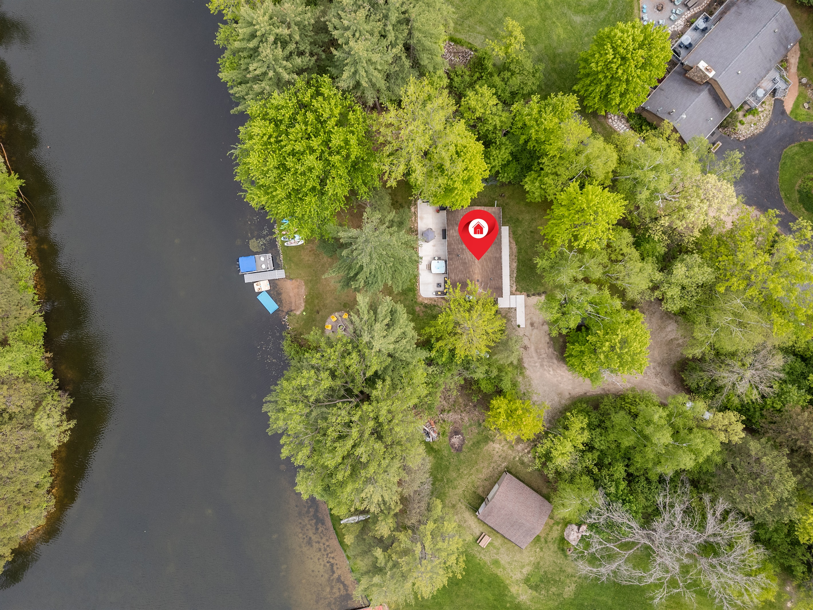 Where peaceful lake life meets a private wooded retreat.
