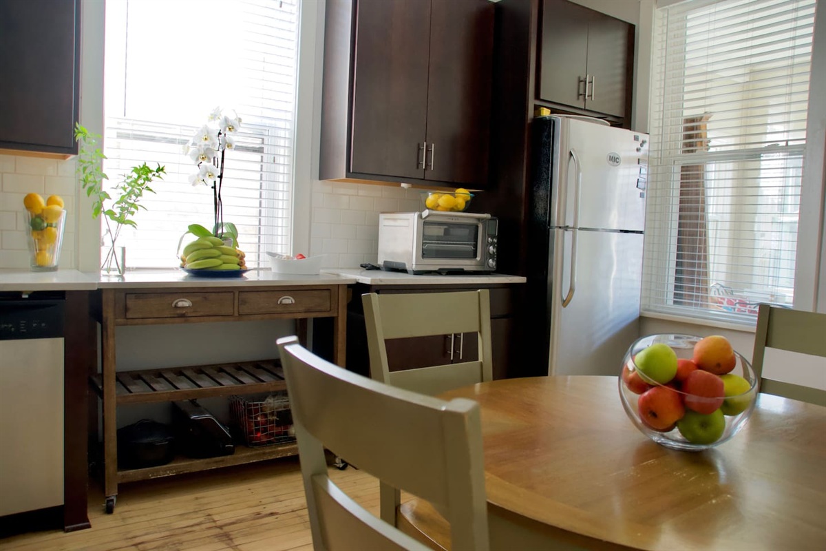 Kitchen and dining space perfect for cooking gathering, and enjoying meals together.