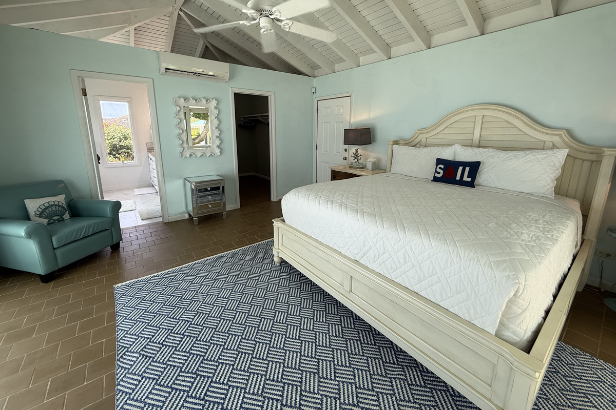 Relax and recharge in this peaceful island-inspired bedroom.