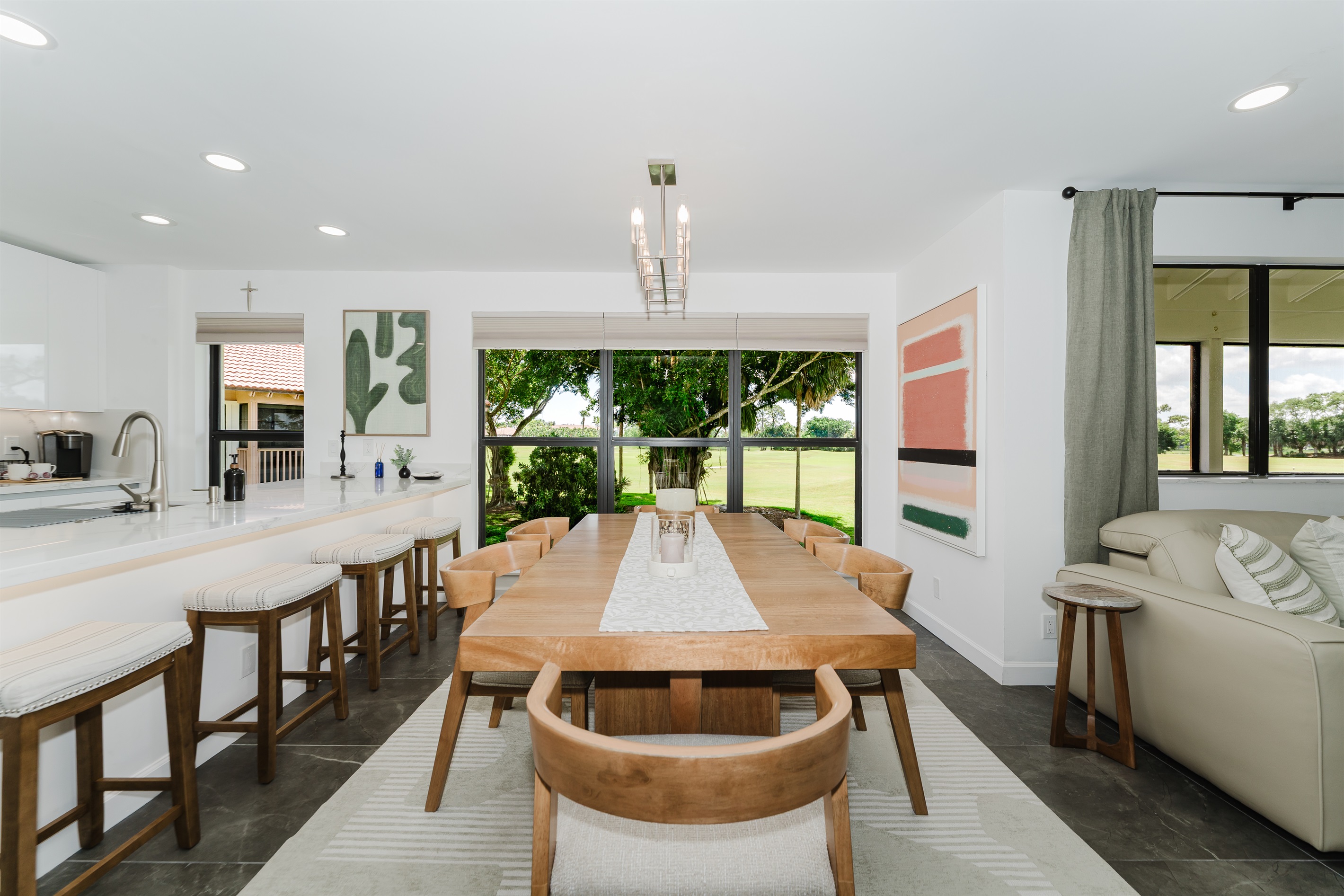 Open-concept dining area that connects seamlessly to the kitchen and living room. Ideal setup for gathering, dining, and creating lasting memories.