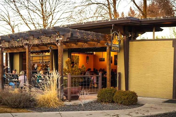 South Perry Pizza boasts great pizzas and salads. Only a .3 mile stroll to a beautiful patio dining experience! 