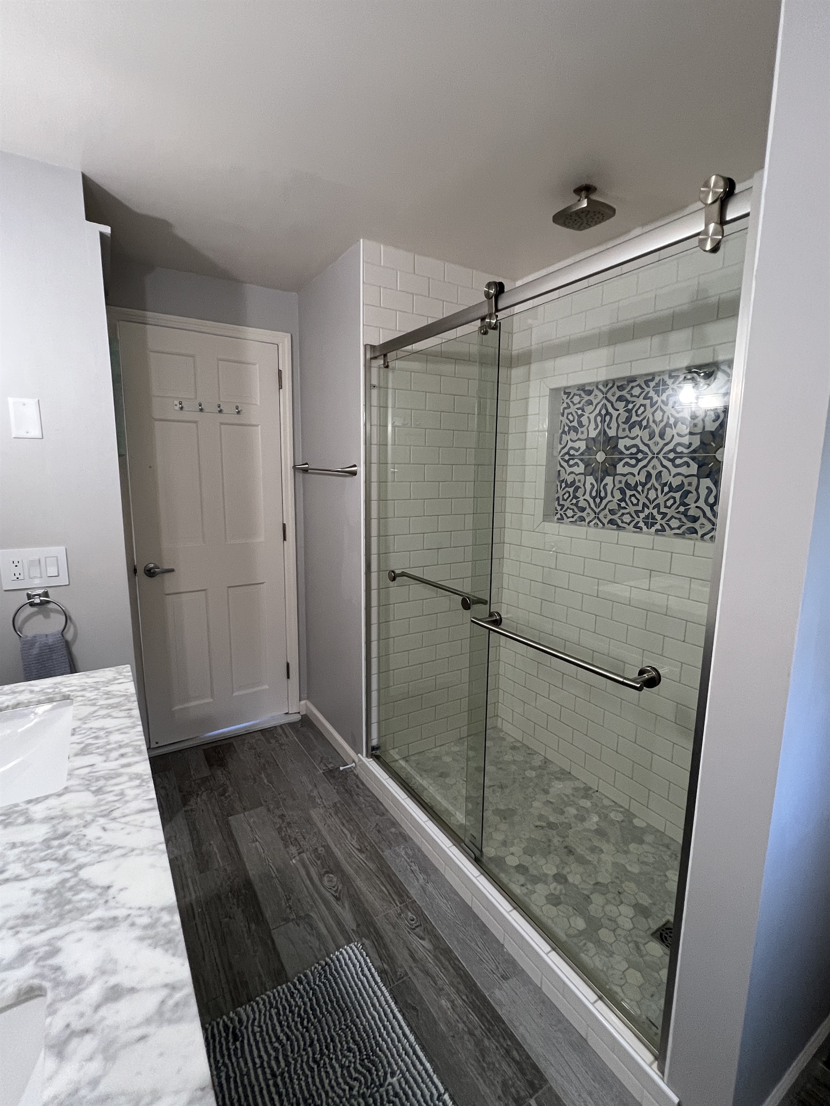 Hilltop Hideaway 1st floor full bathroom with custom tile shower.