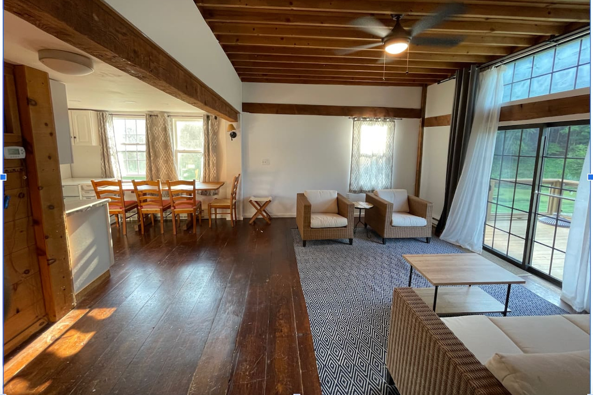 Living room of 2 bedroom barn apartment seen from 2nd bedroom