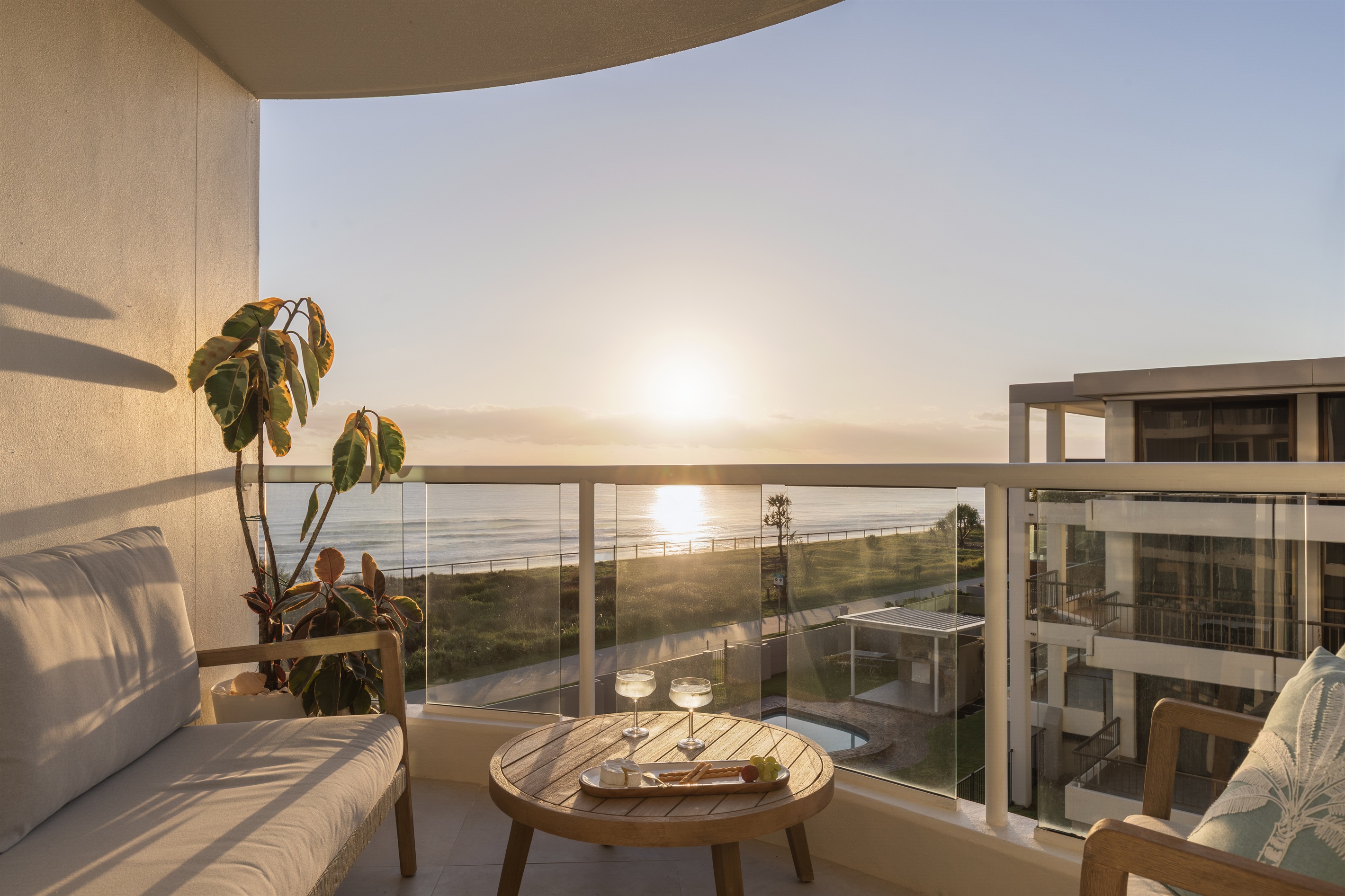 One of two private balconies, relax with ocean views, sunrise and sunset skies. 