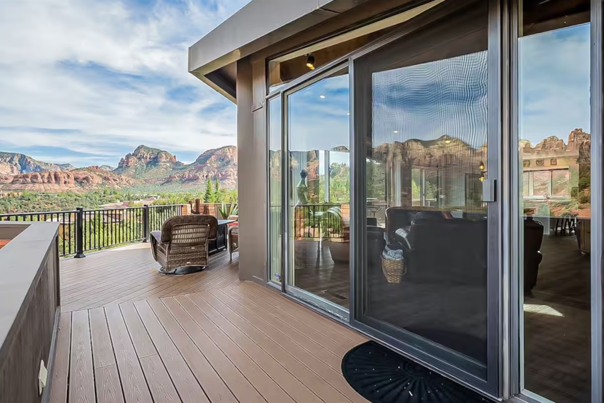 Blur the lines between the living room and the great outdoors by opening the glass sliding doors.